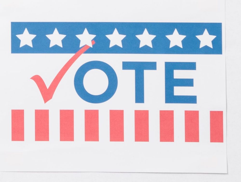 A VOTE sign with a red checkmark